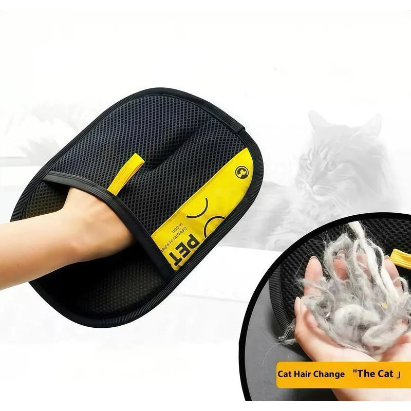 Peeling collected fur off the grooming glove