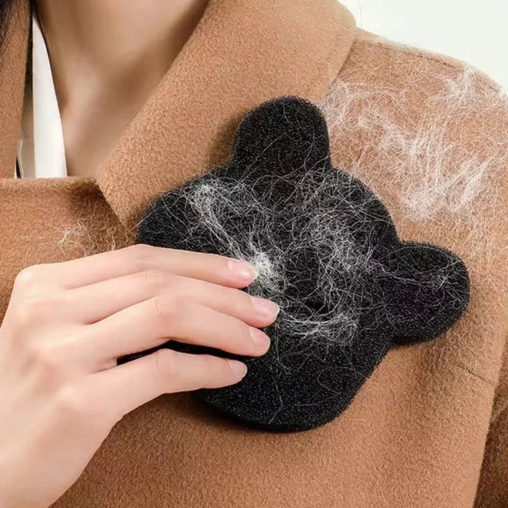 Fur catcher sponge collecting pet hair in laundry